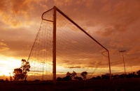 Soccer goal at sunset.